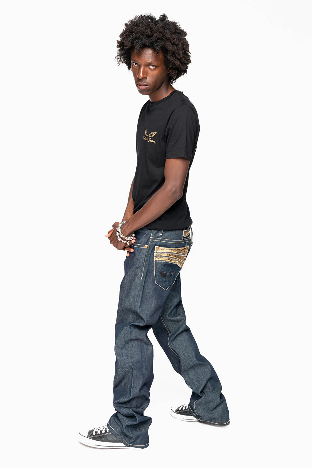 BOOT CUT JEAN IN RAW DENIM WITH GOLD LEATHER ZIPPER EMBELLISHMENT ON BACK POCKETS - Image 9