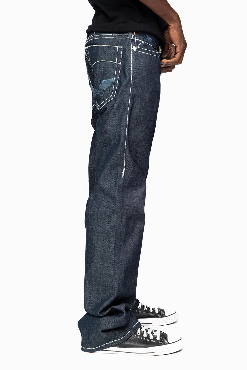 ROBIN’S BOOT CUT JEAN IN RAW DENIM WITH HEAVY WHITE STITCHING WITH EMBROIDERED WING LOGO ON BACK POCKETS - Image 4