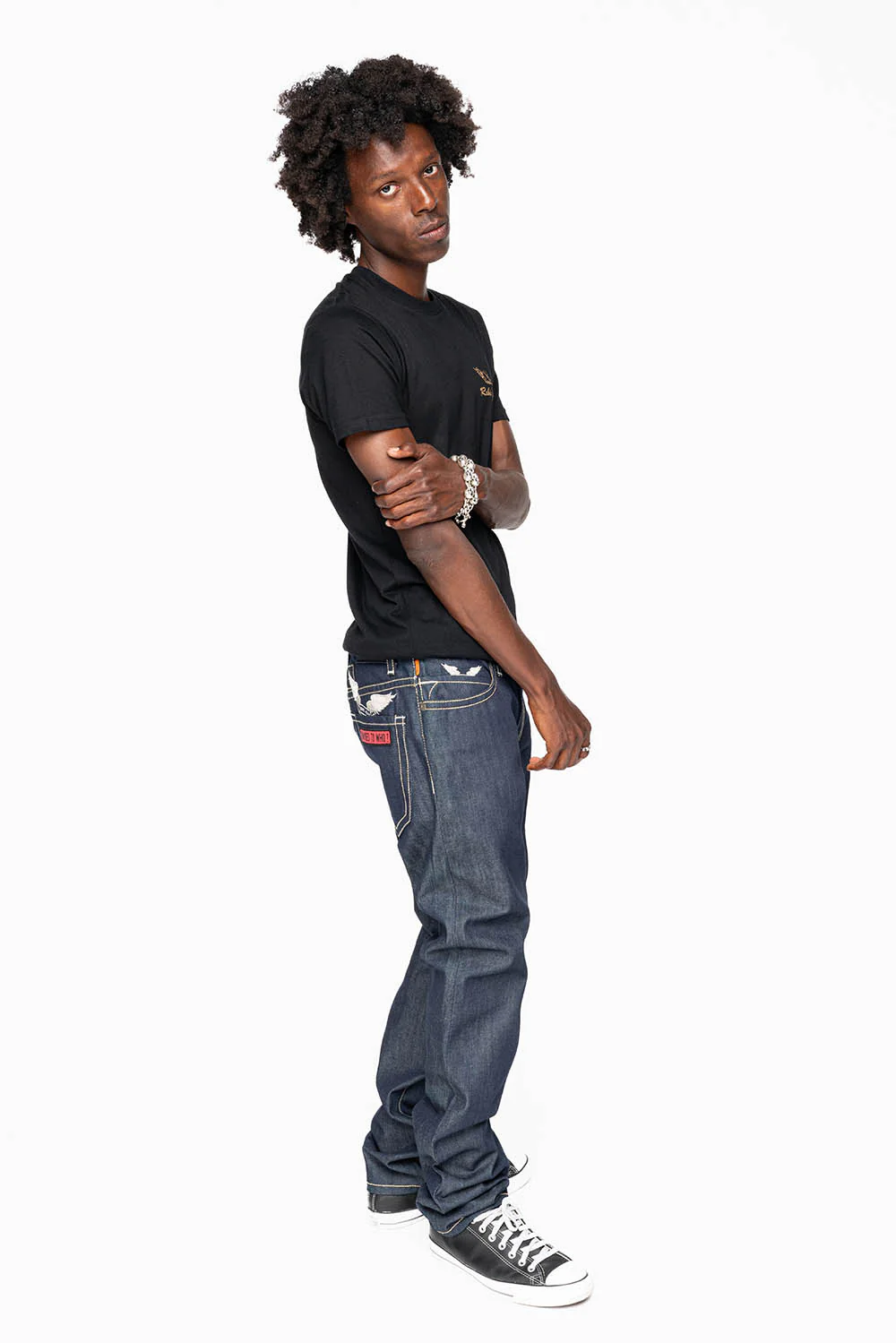 ROBIN’S BRITISH FLAG SLIM JEANS IN RAW DENIM EMBROIDERED ROBIN”S WING LOGO ON THE BACK  WITH PATCHES - Image 9