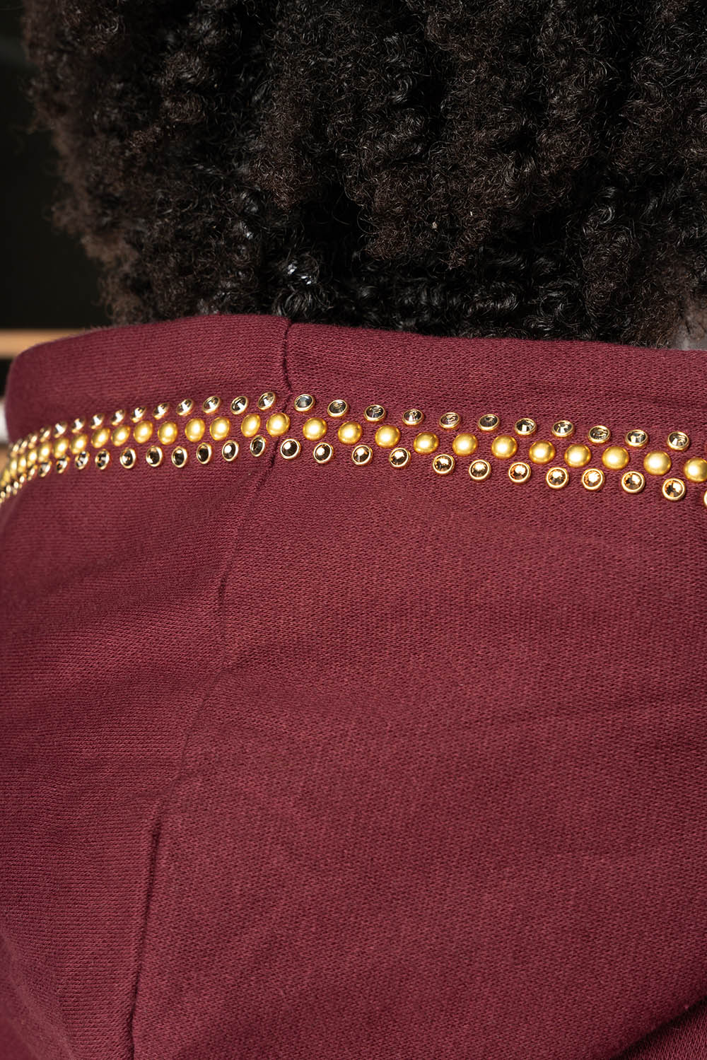 ROBIN’S JEAN PULLOVER HOODIE IN BURGUNDY EMBELLISHED WITH  CRYSTALS  AND NAILHEADS - Image 8