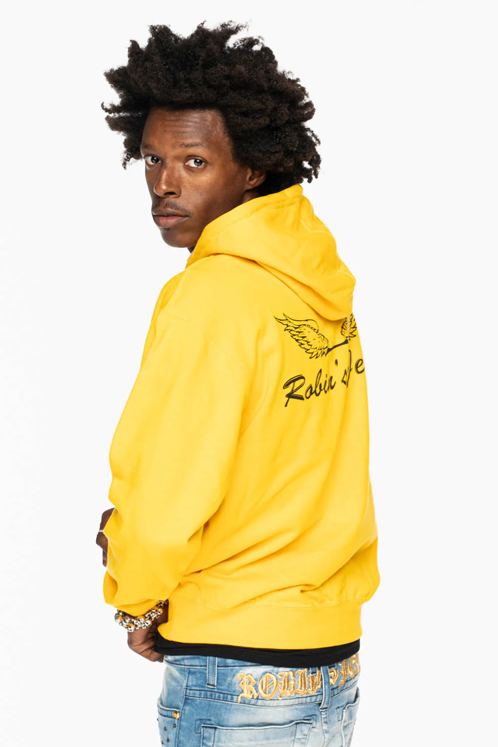 ROBIN’S JEAN PULLOVER HOODIE IN YELLOW WITH  BLACK WING PRINT - Image 7